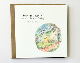 May include: A Winnie the Pooh illustration with the quote "Home isn't just a place... It's a feeling."  Winnie the Pooh is sitting on a path outside a small house with a sign that says "Mr. Sand."