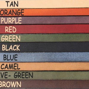 May include: A selection of leather straps in various colors, including tan, orange, purple, red, green, black, blue, camel, olive green, and brown.