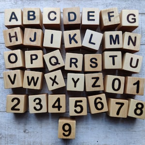 English alphabet wooden blocks, blocks with letter and numbers, ABC blocks learning,