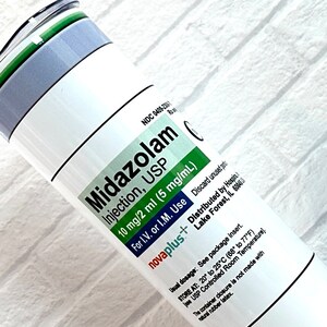Midazolam Versed 20 oz skinny tumbler.