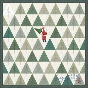 May include: A green and white patchwork quilt with a pattern of triangles. A red and white figure of Santa Claus is in the center of the quilt, carrying a green Christmas tree. The quilt is signed "Angie Padilla" in the bottom right corner.