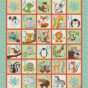May include: A colorful alphabet quilt featuring various animals, each paired with a letter. The quilt showcases a patchwork design with squares of animals like a dog, fox, and zebra, with a floral border and the name "Angie Padilla".