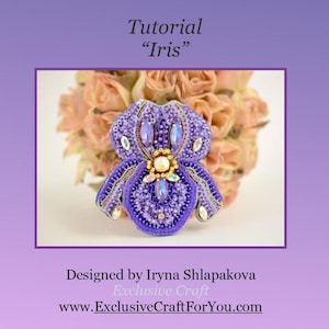 May include: A handcrafted, beaded iris flower brooch in shades of purple, with iridescent crystals and a gold-toned center. The image includes the text "Tutorial Iris" and the designer's name.