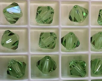 Lot of 24 Peridot 8mm Bicone Swarovski #5301 Crystal beads suncatcher jewelry parts Austrian Crystal beads Vintage swarovski crystal beads