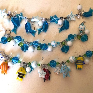 Adorable Vintage nautical lamp-glass trinket bracelet gift. Perfect for a beach or tropical theme 3 styles to choose from