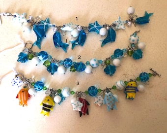 Adorable Vintage nautical lamp-glass trinket bracelet gift. Perfect for a beach or tropical theme 3 styles to choose from