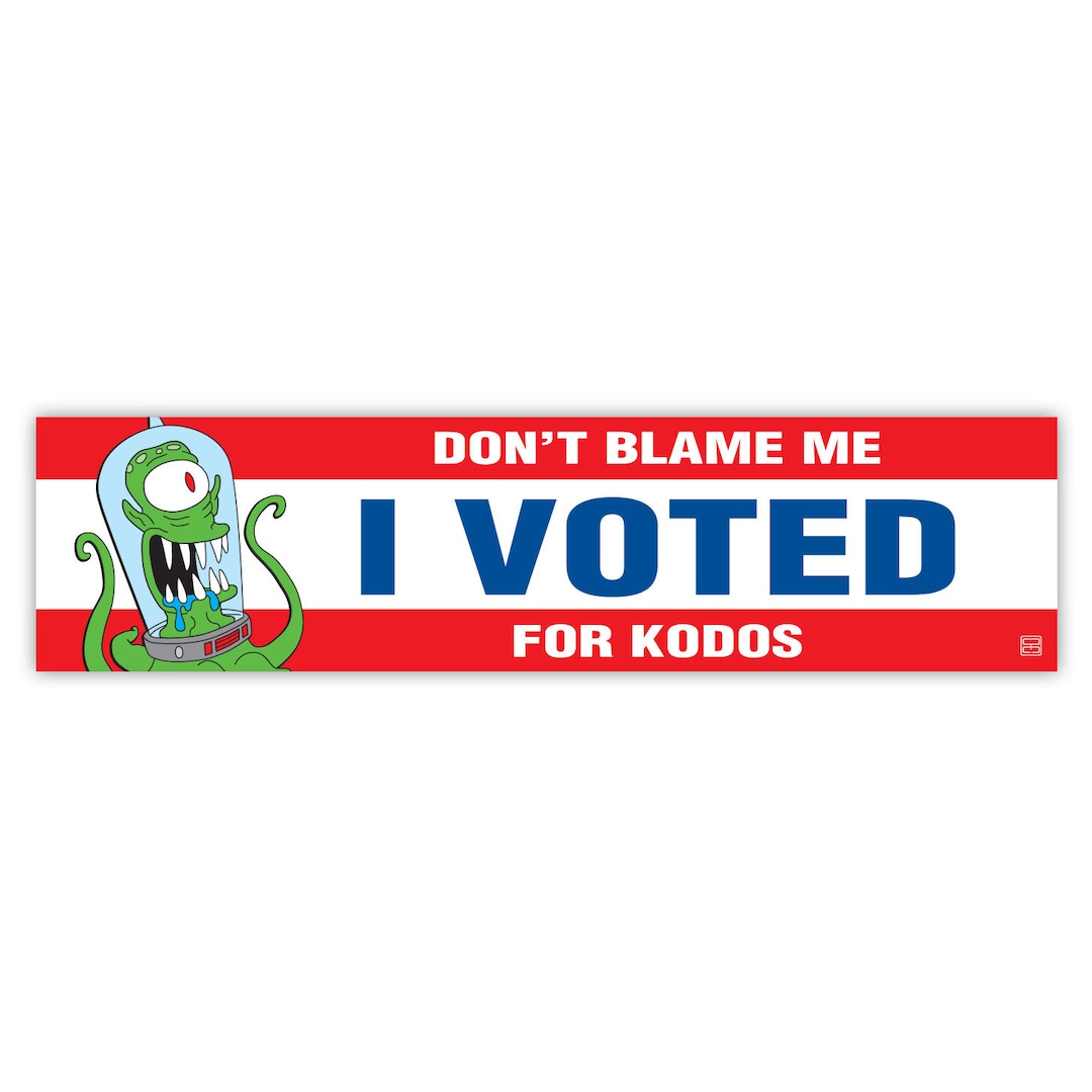 A circular sticker from Etsy proclaiming 'Don't Blame Me, I Voted for Kodos' with a stylized cartoon alien head at the center.
