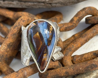 Bold, beautiful, bodacious, boulder opal.  Statement ring with crazy amazing colors.