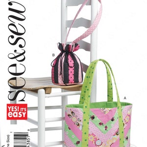 May include: A sewing pattern featuring two fabric bags. One is a tote bag with pink, green, and floral patterns. The other is a drawstring bag with black and pink stripes and polka dots. The text "B5596" and "YES! IT'S easy" are visible.