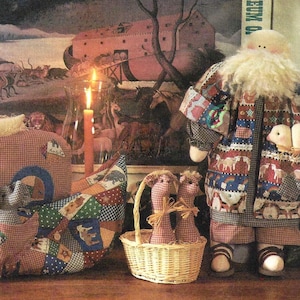 May include: Simplicity Holiday pattern collection featuring a Santa Claus doll, a basket with two fabric bunnies, and a patchwork boat with a stuffed animal. The pattern collection is labeled "7426" and "ONE SIZE".