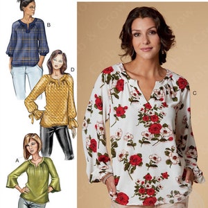May include: A sewing pattern for a women's blouse with a V-neck and long sleeves. The pattern includes three different styles: a plaid blouse, a polka dot blouse, and a floral blouse. The pattern is for sizes 14-16-18-20-22. The pattern number is B6632/E5.