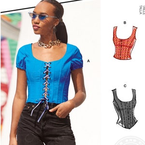 May include: A sewing pattern for a blue corset top with a lace-up front. The pattern includes multiple view options with simple instructions. The pattern is for sizes A5 (6-8-10-12-14). The pattern is from McCall's and includes the hashtag #MonicaMcCalls.