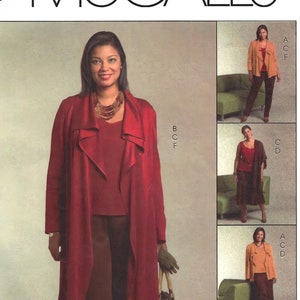 May include: Sewing pattern for a long red cardigan, a red top, and brown pants. The pattern is for sizes extra small, small, and medium. The pattern number is M5195.