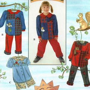 May include: Simplicity sewing pattern 7277 featuring children's clothing designs. The pattern includes a blue and red plaid jacket and pants set, a blue dress with floral embroidery, and a red jacket with black pants. The text "Just Be 'Cuz" is visible.
