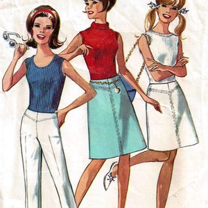 May include: Vintage Simplicity sewing pattern featuring three illustrated women in 1960s outfits. The pattern cover displays the number 6451 and the word "Simplicity" in red. The models are wearing a variety of tops, skirts, and pants.