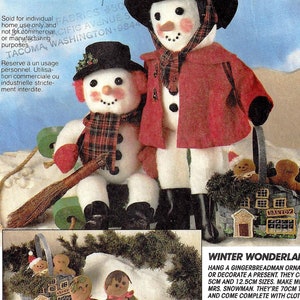 May include: A sewing pattern for making a gingerbread man ornament, a snowman, and a gingerbread house. The pattern is called "Winter Wonderland" and is from McCall's Crafts. The pattern number is 6157.