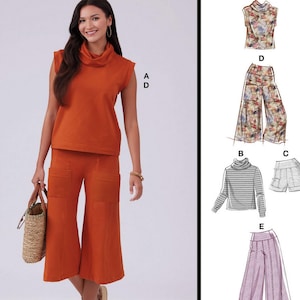 May include: McCall's sewing pattern M8456 featuring a woman in an orange sleeveless top and matching culottes. The pattern includes multiple view options, including a floral top, striped turtleneck, shorts, and wide-leg pants. Designed and printed in the USA.