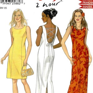 May include: A sewing pattern for three sleeveless dresses. The dresses are yellow, white, and orange with floral patterns. The pattern is from New Look and is labeled "Easy 2 hour".