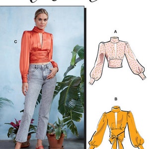 May include: A sewing pattern for a blouse with three different views. The pattern includes a red blouse with a keyhole neckline, a pink blouse with white polka dots, and a yellow blouse with a bow tie. The pattern is called #AlisterMcCalls.