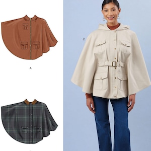 May include: Simplicity sewing pattern S3033 featuring a hooded cape with pockets and a belt. The image shows a woman wearing the cape, along with illustrations of the cape in brown and plaid fabrics. The pattern is designed and printed in the USA.