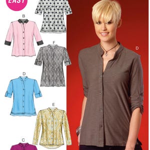 May include: McCall's M7018 sewing pattern envelope featuring a brown button-down shirt with a mandarin collar and three-quarter sleeves. The cover displays various shirt designs labeled A through F, including patterned and solid color options.