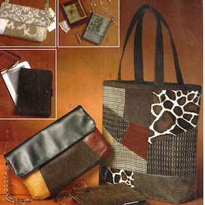 May include: A sewing pattern by Butterick, B5437, featuring various bag designs. The image showcases a tote bag with a giraffe print panel, a clutch, and other small bags. The pattern includes multiple sizes and styles.