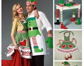 McCalls M6860 Sewing Pattern Holiday Aprons Oven Mitts Hat Slippers and Table Leg Decorations Uncut