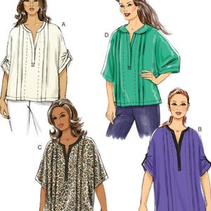 May include: Butterick B6147 sewing pattern illustration featuring four variations of a loose-fitting tunic top. The designs include a white version, a green version, a leopard print version, and a purple version, all with a V-neckline and pleats.