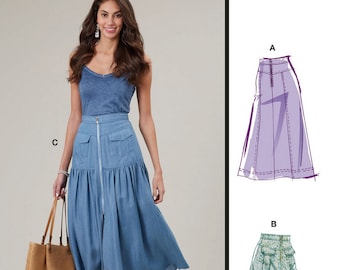 May include: Sewing pattern for a skirt with a front zip and pockets. The pattern includes three different skirt styles: a purple A-line skirt, a green floral skirt, and a blue denim skirt. The pattern is from McCall's and the pattern number is M8389.
