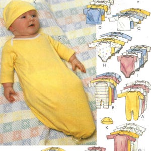 May include: McCall's sewing pattern for baby clothing, featuring a yellow sleep sack, hat, and various other garment designs. The pattern number is 8574. The image includes illustrations of the finished products.