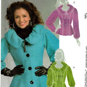 May include: A sewing pattern for a women's jacket and blouse. The pattern is for sizes 6-8-10-12. The jacket is teal blue with a large ruffled collar and buttons down the front. The blouse is green with a ruffled collar and a bow tie. The pattern is from McCall's and the pattern number is M5758.