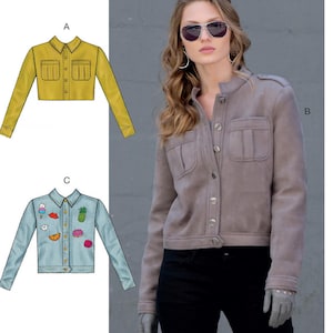 May include: McCall's sewing pattern M8011 features three jacket designs. The image shows a woman wearing a gray jacket. The pattern includes a yellow jacket, a gray jacket, and a light blue denim jacket with fruit and ice cream patches.