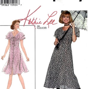 May include: Simplicity sewing pattern number 9189 for a dress designed by Kathie Lee for Plaza South. The pattern includes two different dress styles, one with a pink polka dot print and the other with a black and white floral print. The pattern is available in sizes 6, 8, and 10.