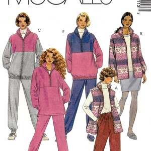 May include: A sewing pattern for a women's tracksuit. The pattern includes five different styles: a pink and grey tracksuit, a pink and blue tracksuit, a pink and white tracksuit, a pink and white vest, and a pink and white skirt. The pattern is for sizes 14-16-18.