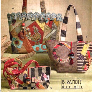May include: Vogue accessories pattern for tote bags. The image shows three different tote bag designs. One bag has a patchwork design with a bird applique, another has a striped handle, and the third has a black and white checkered pattern.