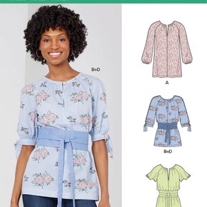May include: A sewing pattern for a blouse with a floral print. The pattern includes three different styles: a long-sleeved blouse with a tie at the waist, a short-sleeved blouse with a tie at the waist, and a short-sleeved blouse with a tie at the waist. The pattern is for sizes B+D and C+D. The pattern number is N6621.