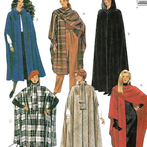 May include: A McCall's 8936 sewing pattern envelope featuring illustrations of various capes and ponchos. The designs include a blue hooded cape, a plaid wrap, a black hooded cape, a plaid poncho, a textured cape, and a red wrap, with text.