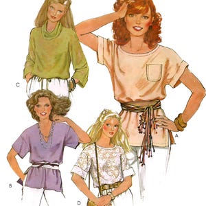May include: A McCalls sewing pattern envelope featuring illustrations of four different top designs. The tops include a light green cowl neck, a peach shirt with a pocket, a purple V-neck, and a white patterned top, all paired with white pants.