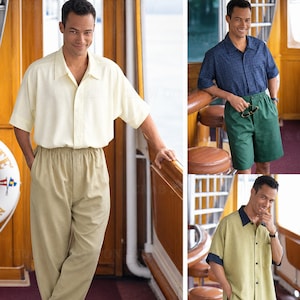 May include: A collection of short-sleeved button-down shirts paired with trousers or shorts. The outfits include a cream shirt with khaki trousers, a navy blue patterned shirt with green shorts, and a light green shirt with dark blue shorts.