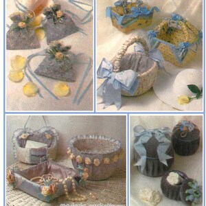 May include: A collection of handmade fabric items, including small drawstring bags, baskets, and decorative containers. The items are in shades of blue, gray, and yellow, adorned with ribbons, bows, and floral accents. A white hat with a yellow rose is also present.