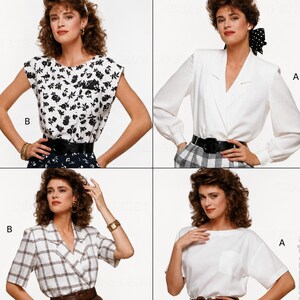 May include: A sewing pattern envelope featuring four blouse variations: a sleeveless white top with black floral print, a long-sleeved white collared blouse, a short-sleeved white blouse with a brown plaid pattern, and a plain white short-sleeved top.