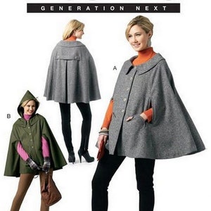 May include: McCall's Generation Next sewing pattern M6446. The image shows a gray cape with a button closure and pockets, and a green hooded cape. The pattern includes sizes D5 (12-14-16-18-20).