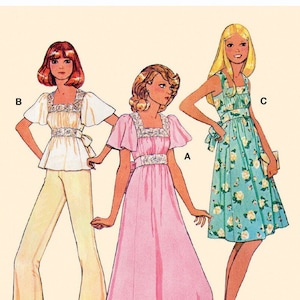 May include: Vintage sewing pattern McCall's M8258 for a dress and top. The pattern includes three different styles: a long pink dress, a shorter blue floral dress, and a white top with matching pants. The pattern is labeled "Vintage 70's".