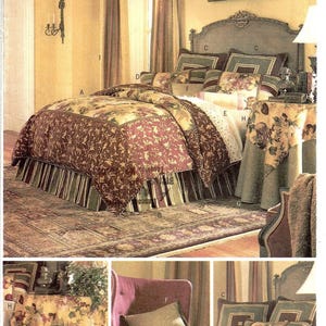 May include: Butterick 3559 Waverly sewing pattern for home decor featuring a bedspread, bed skirt, pillows, and tablecloth. The design includes floral and scroll patterns in shades of burgundy, green, and cream, with labeled components A through H.