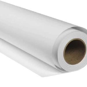May include: A white roll of paper, likely for printing or crafting, is rolled up and ready to be used.