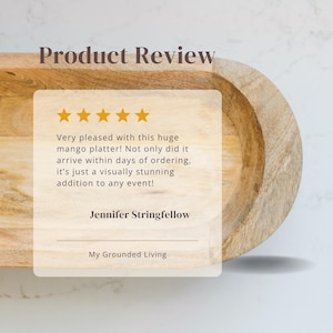 May include: A wooden mango platter with an oval shape. The image includes a customer review with text that reads "Product Review" and "Very pleased with this huge mango platter!" The review is from Jennifer Stringfellow.