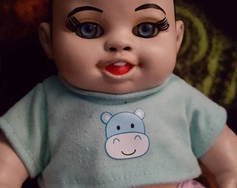 vampire baby doll with eyes that follow you