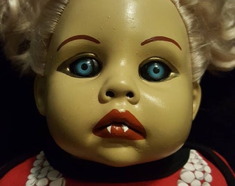 vampire baby doll with moving eyes for sale