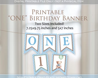 May include: A printable birthday banner with the word "ONE" spelled out on individual pennants. The banner includes two sizes: 7.25x9.75 inches and 5x7 inches. The pennants are white with blue polka dot borders and brown accents. A teddy bear graphic is included.