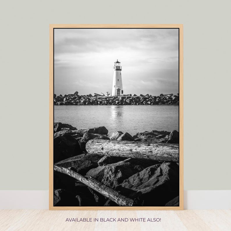 a black and white photo of a lighthouse
